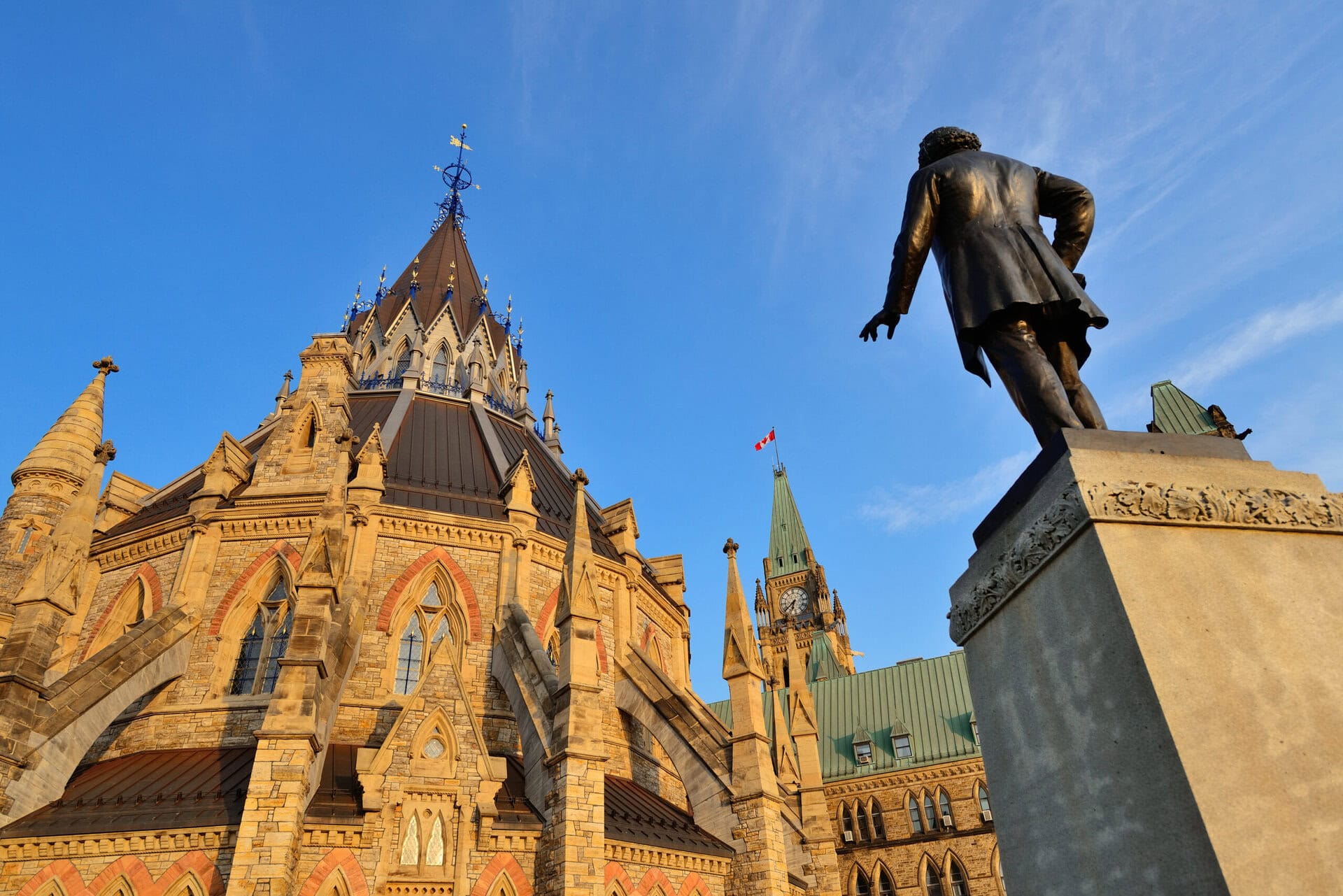 Statue and historical architecture in Ottawa, Canada.