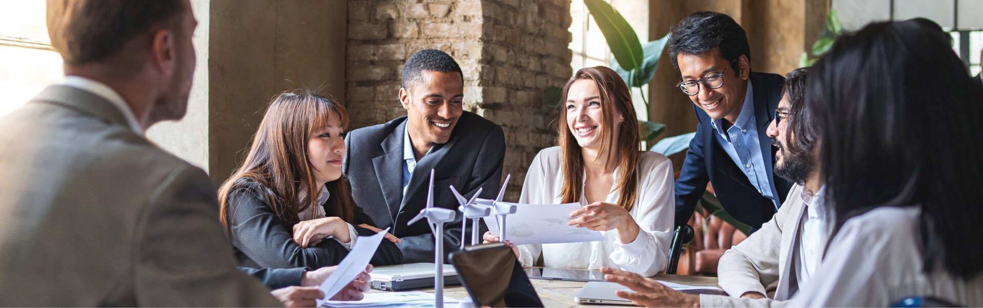 A CareerJoy employee leads a roundtable workshop in a trendy Canadian office